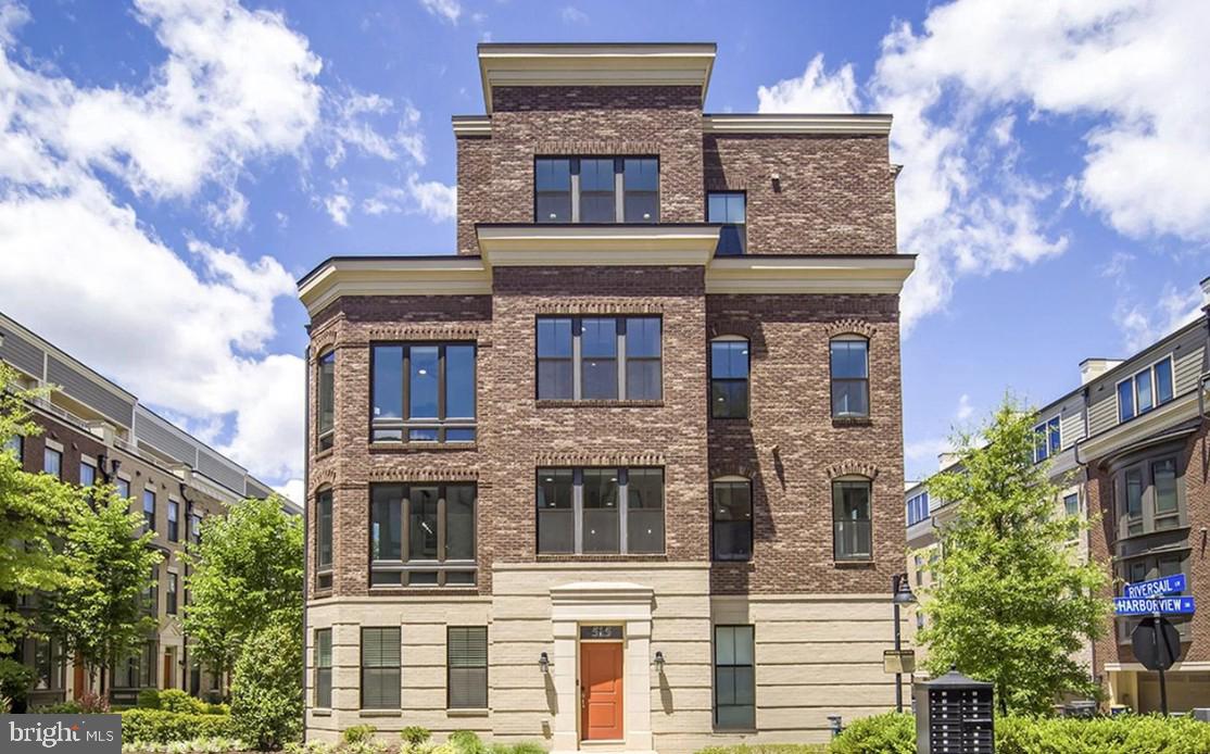 a large building with a window and balcony