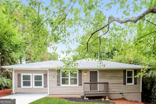 front view of a house with a yard