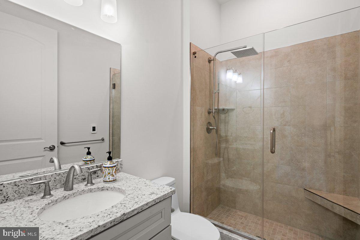 4 Samarpan Court Hightstown, NJ 08520 - Photo 16 of 39 a bathroom with a granite countertop sink toilet and shower