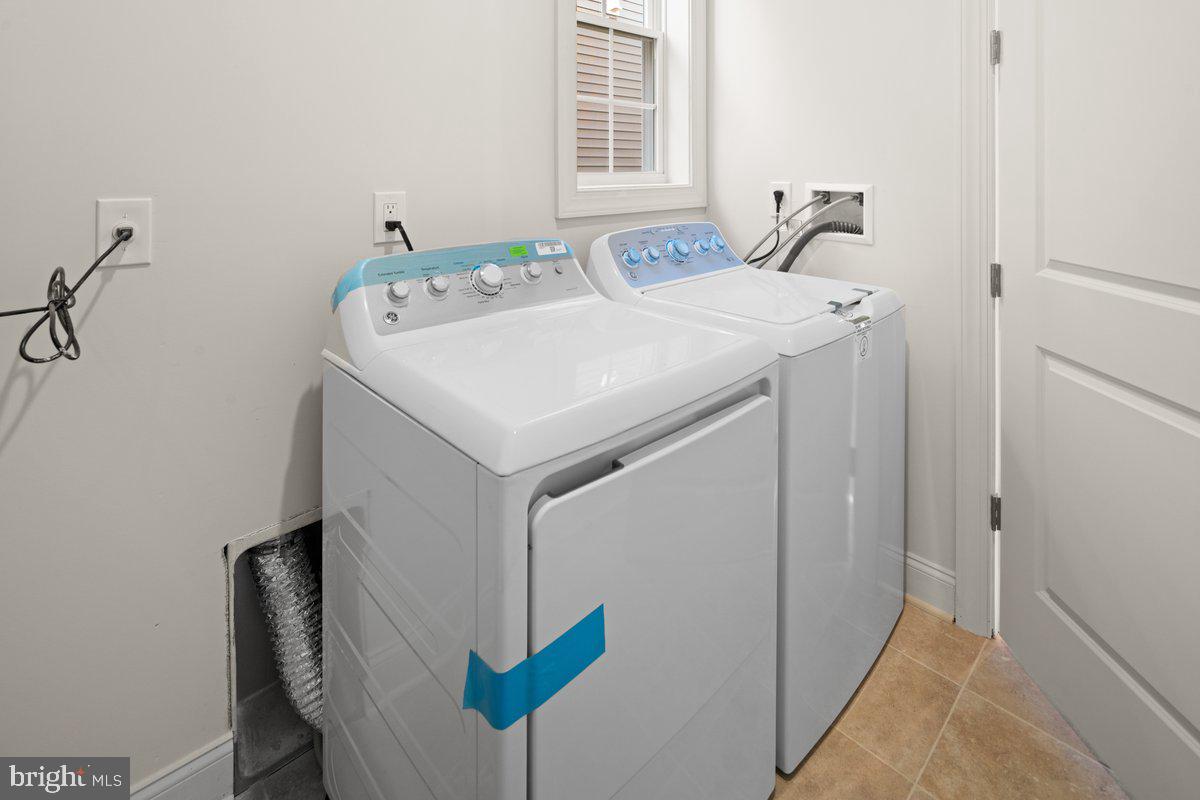 4 Samarpan Court Hightstown, NJ 08520 - Photo 28 of 39 a utility room with dryer and washer
