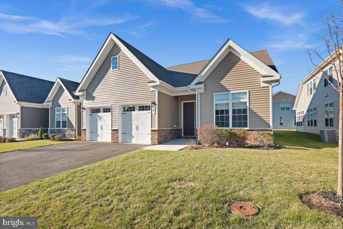 4 Samarpan Court Hightstown, NJ 08520 - Photo 29 of 39 a view of a house with a yard