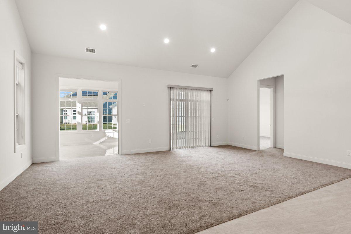 4 Samarpan Court Hightstown, NJ 08520 - Photo 3 of 39 an empty room with windows and entrance