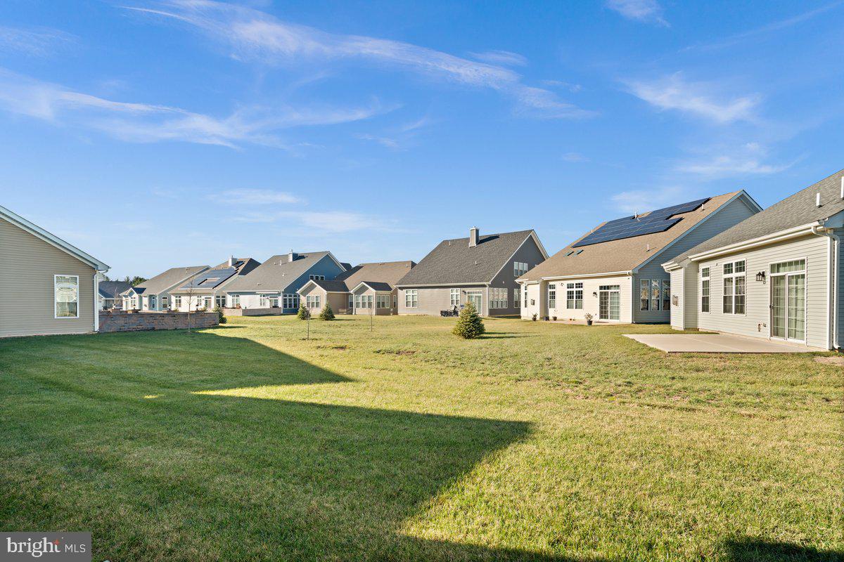 4 Samarpan Court Hightstown, NJ 08520 - Photo 32 of 39 a front view of a house with a yard