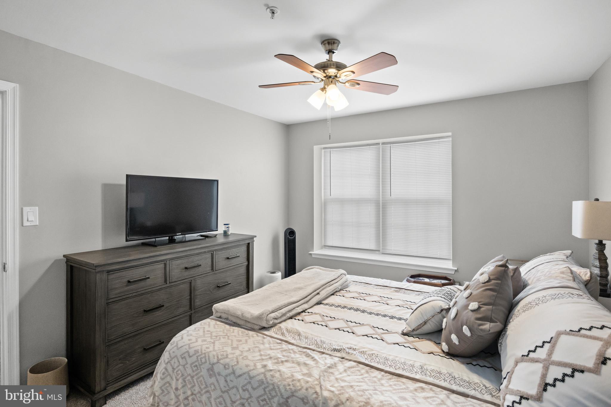 1401 Wharton Road Mount Laurel, NJ 08054 - Photo 13 of 31 a bedroom with a bed and a flat screen tv