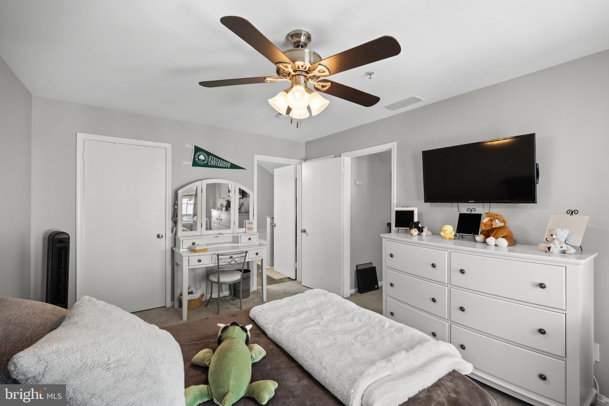 1401 Wharton Road Mount Laurel, NJ 08054 - Photo 20 of 31 a bedroom with a bed and a flat screen tv