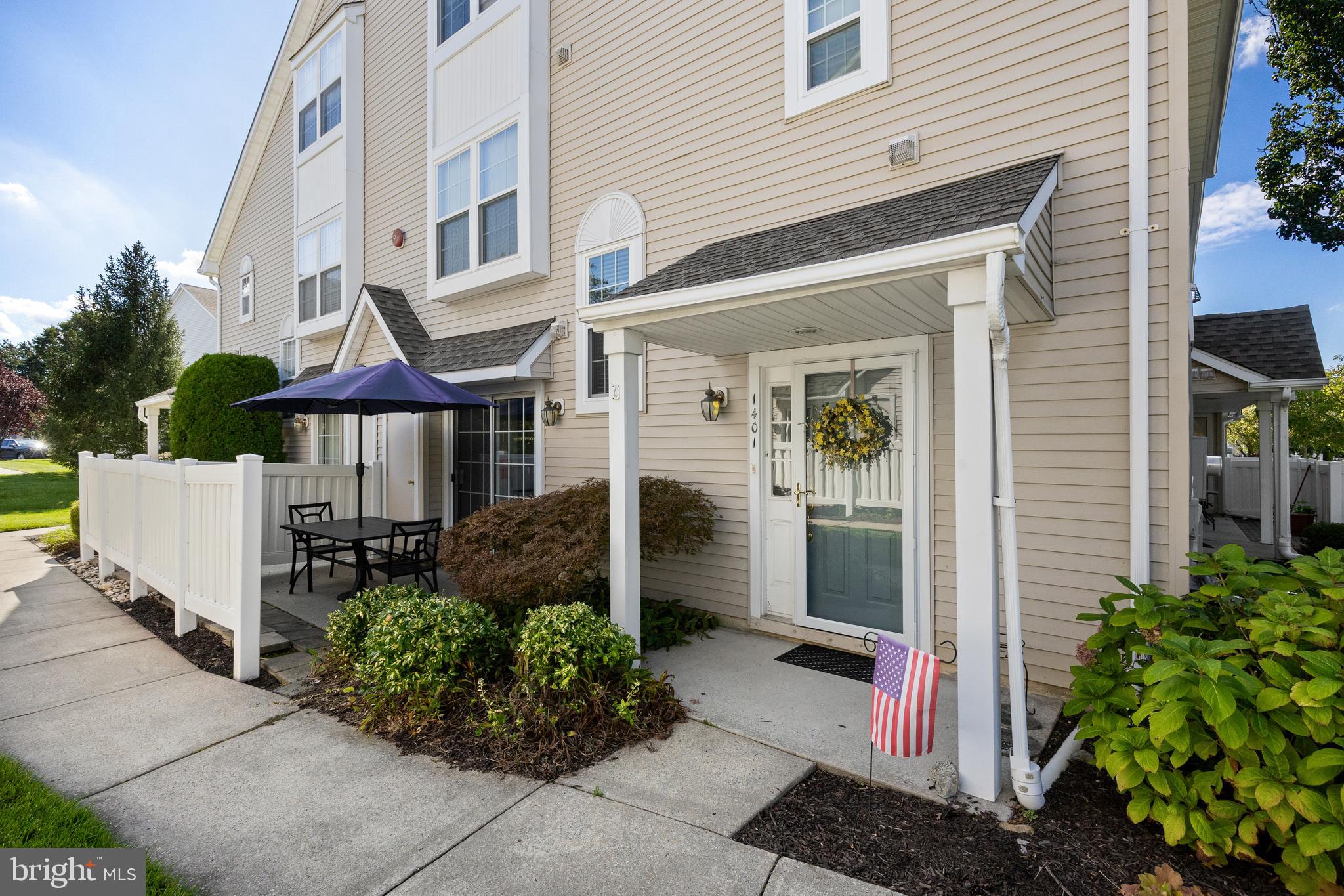 1401 Wharton Road Mount Laurel, NJ 08054 - Photo 3 of 31 a front view of a house with a garden