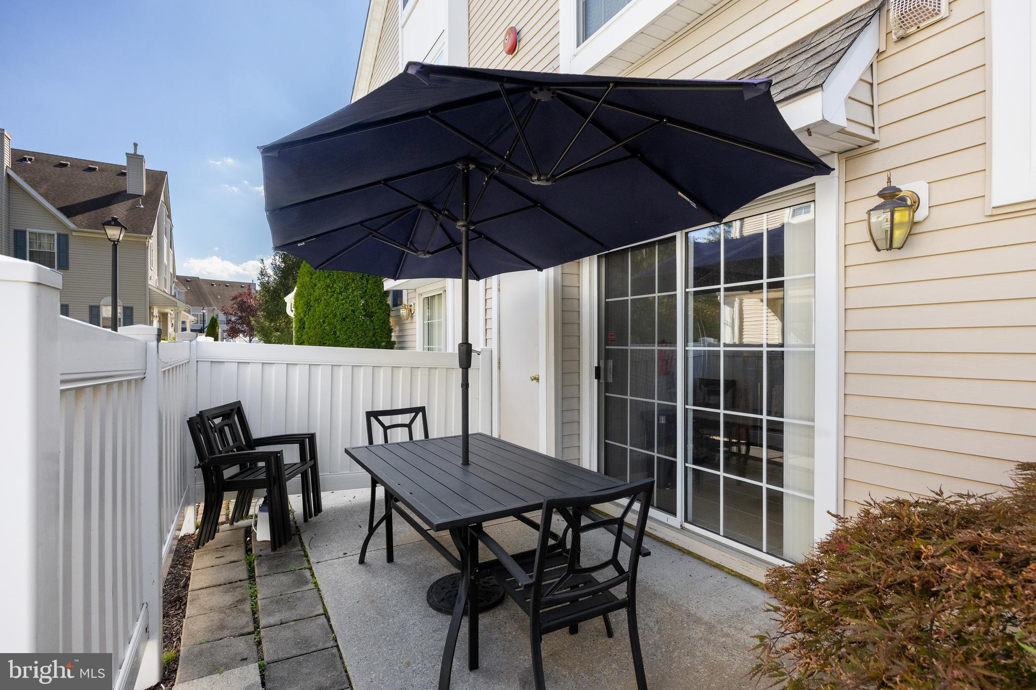 1401 Wharton Road Mount Laurel, NJ 08054 - Photo 4 of 31 a view of backyard of house with seating space