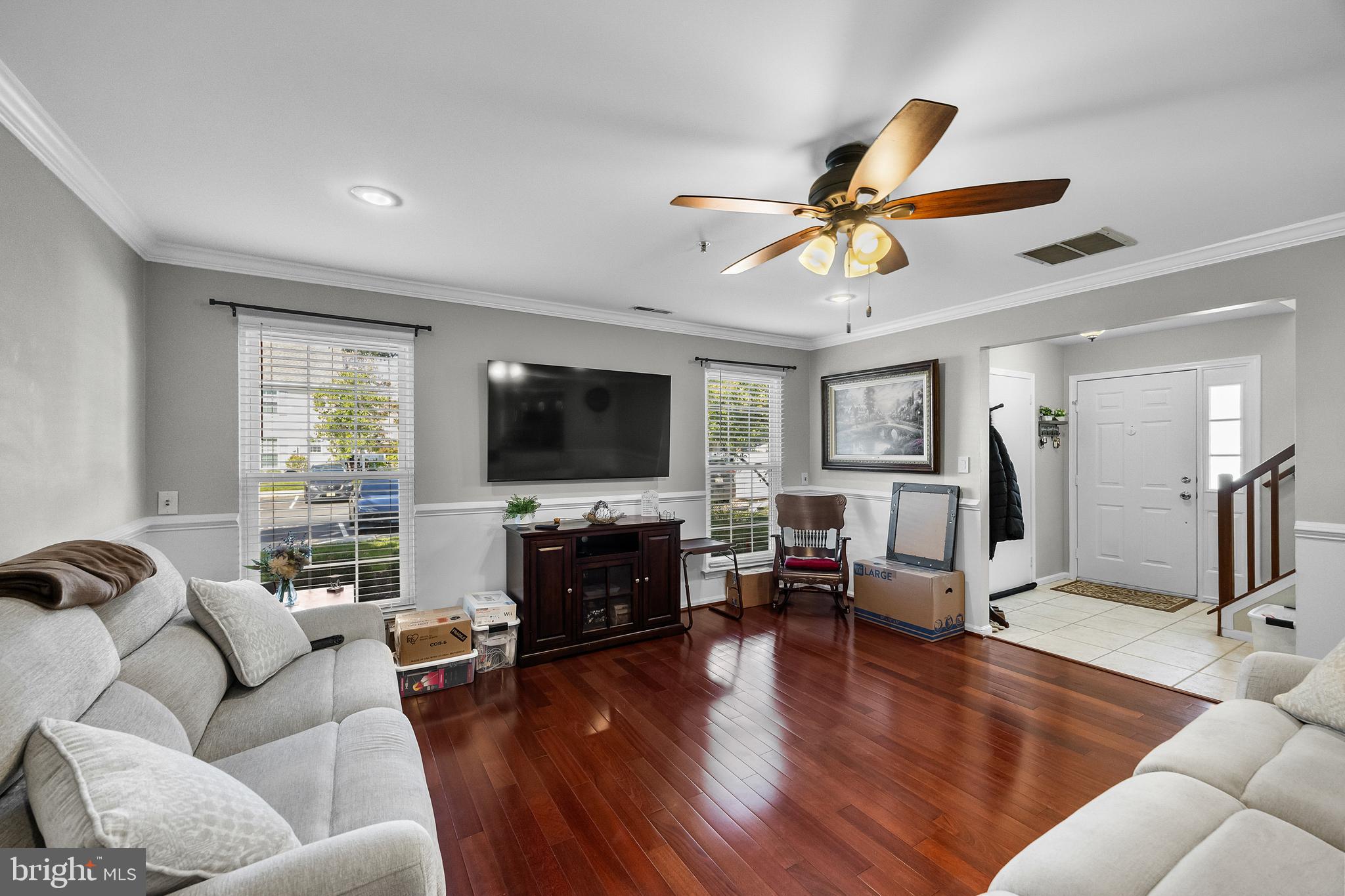 1401 Wharton Road Mount Laurel, NJ 08054 - Photo 6 of 31 a living room with furniture flat screen tv and wooden floor
