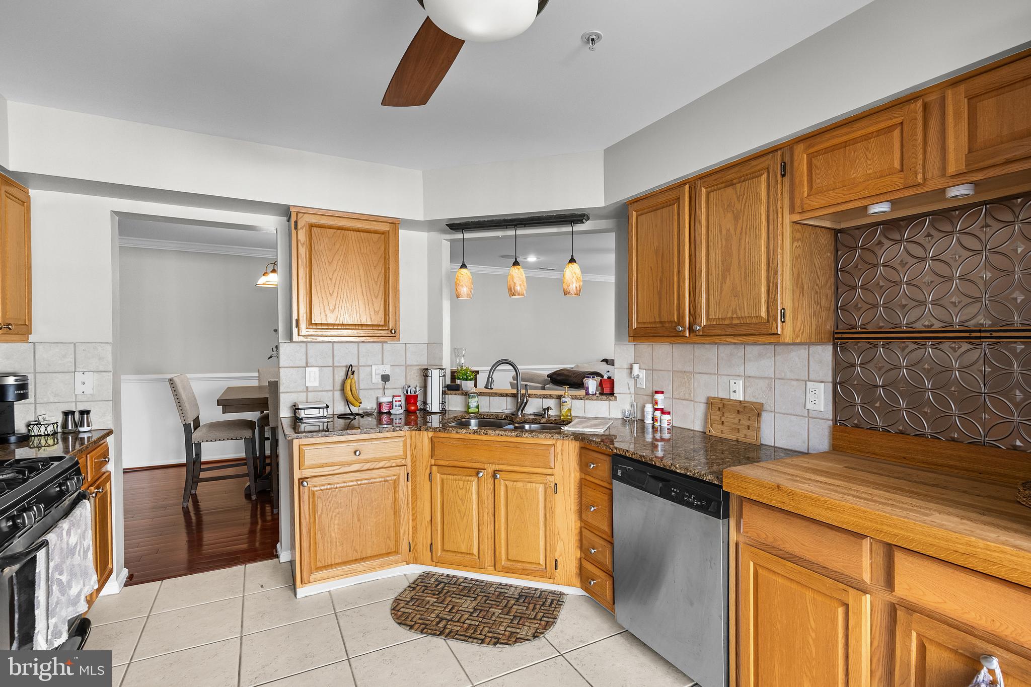 1401 Wharton Road Mount Laurel, NJ 08054 - Photo 9 of 31 a kitchen with a sink stove and cabinets