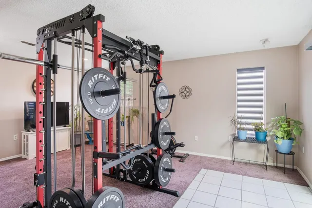 a view of a room with gym equipment
