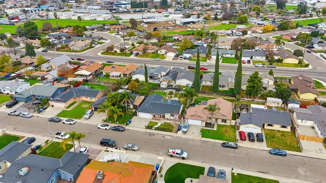 an aerial view of a houses and lake view