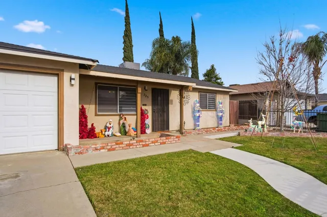 front view of a house with a patio