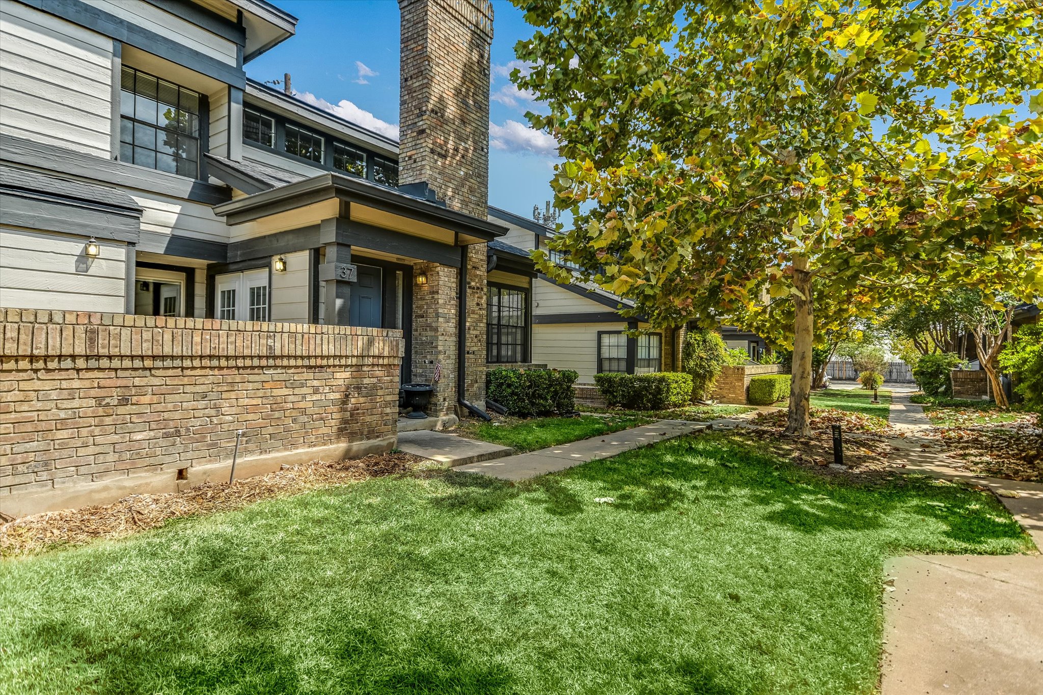 1748 Ohlen Road, Unit 37 Austin, TX 78757 - Photo 1 of 16 A classic brick exterior and private entry path define this handsome multi-level residence.