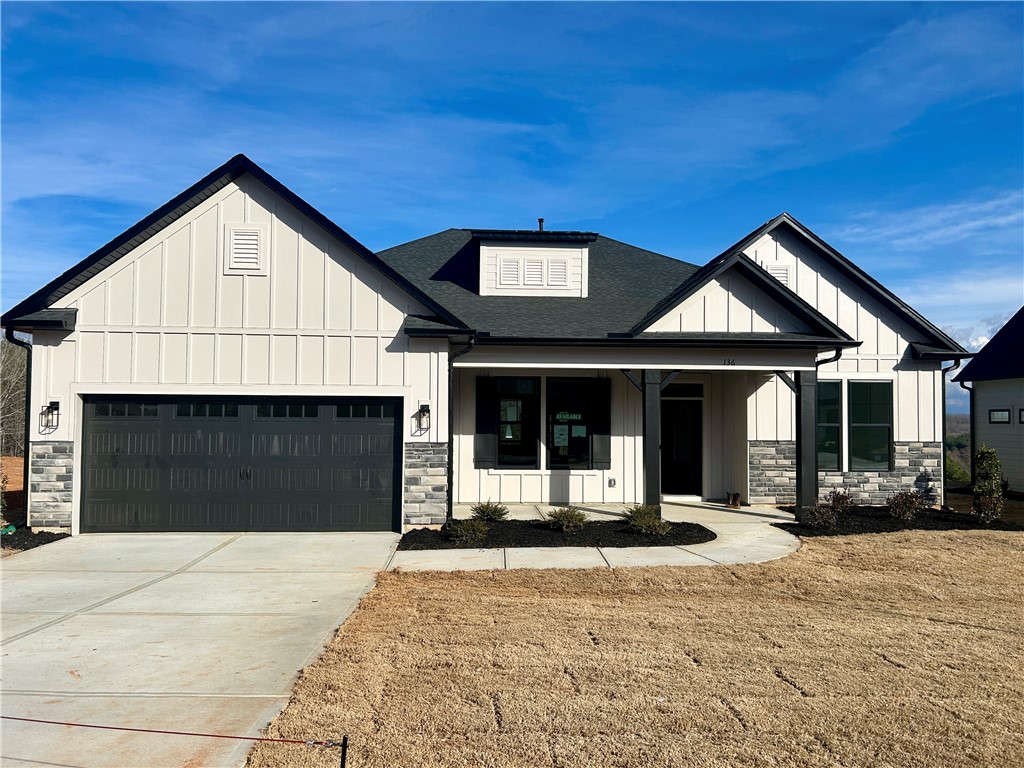 This newly constructed residence presents a blend of classic and contemporary architectural elements.
