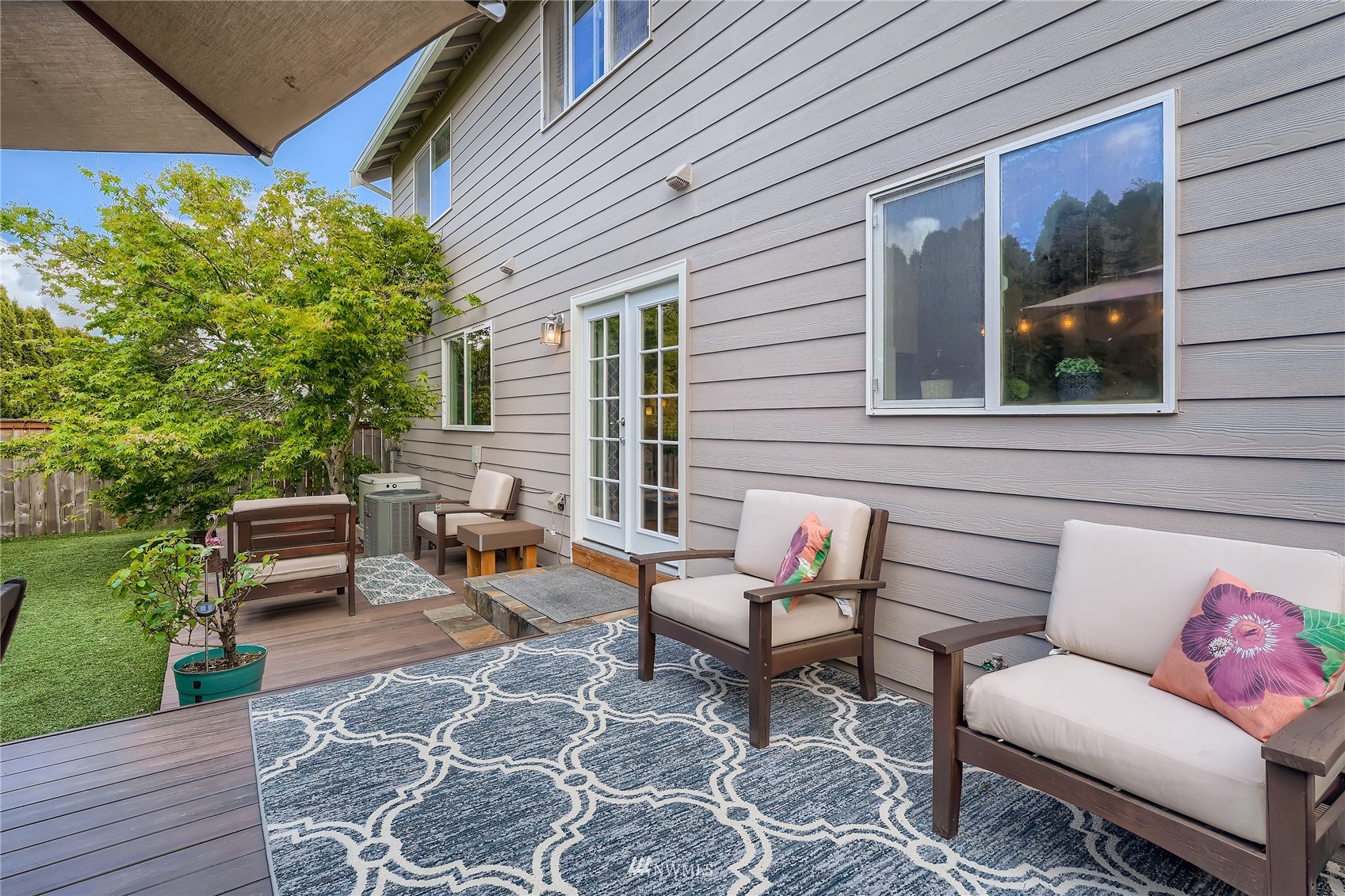 5131 Northeast 10th Place Renton, WA 98059 - Photo 40 of 40 a backyard of a house with outdoor seating