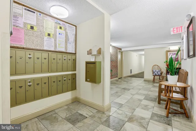 a view of a hallway with workspace