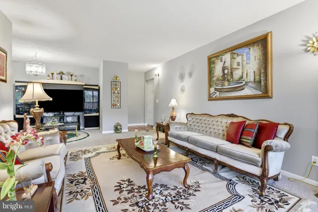 a living room with furniture or couch and a flat screen tv