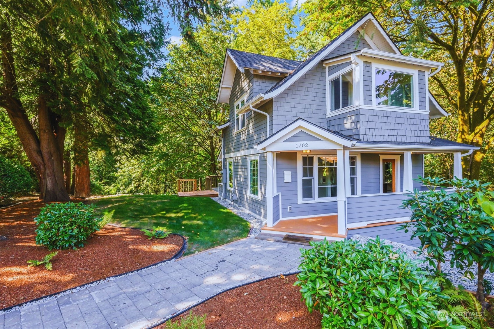 1702 North Pine Street Tacoma, WA 98406 - Photo 2 of 27 a front view of a house with yard and green space