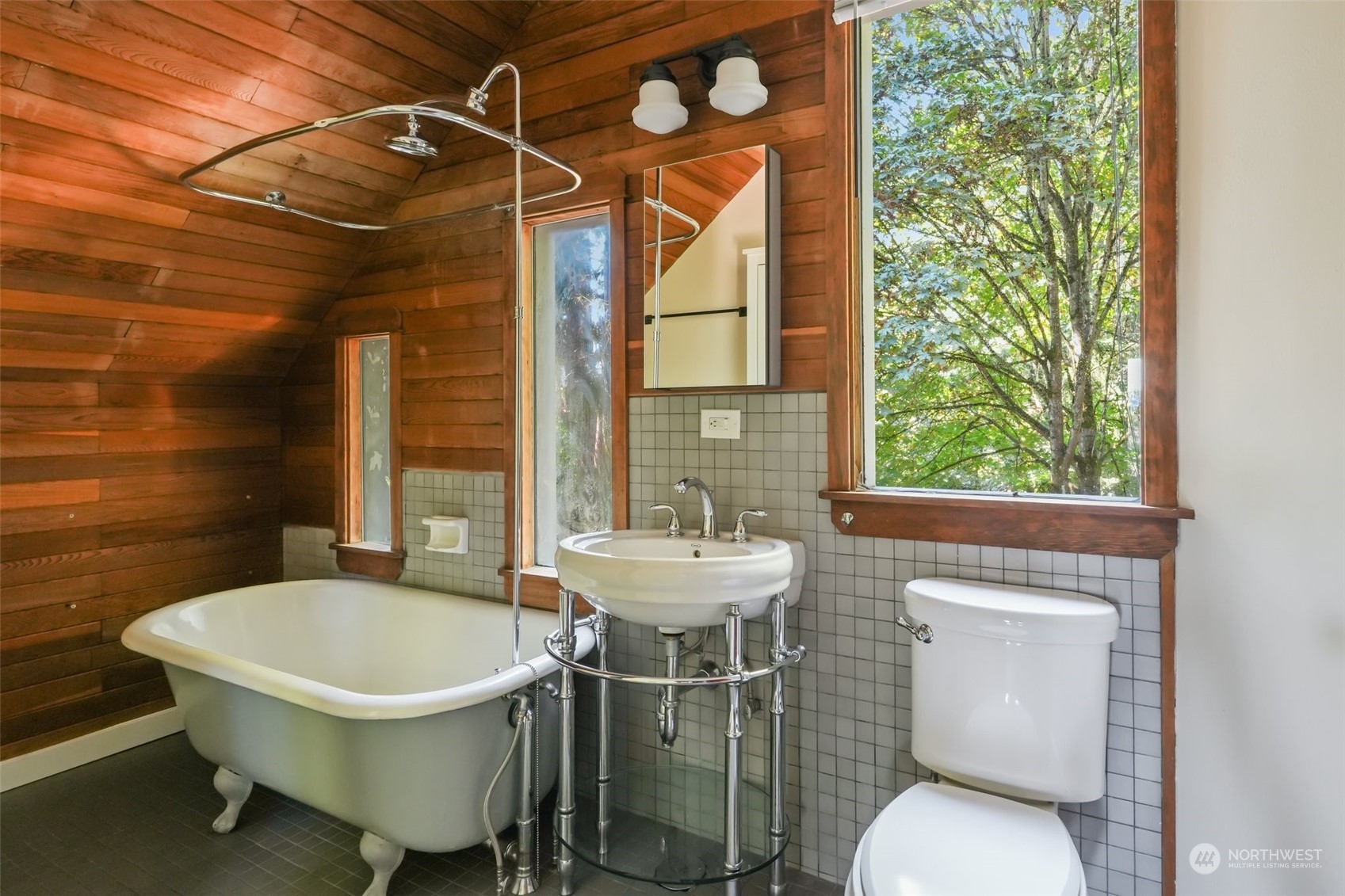 1702 North Pine Street Tacoma, WA 98406 - Photo 21 of 27 a bathroom with a sink toilet and a mirror