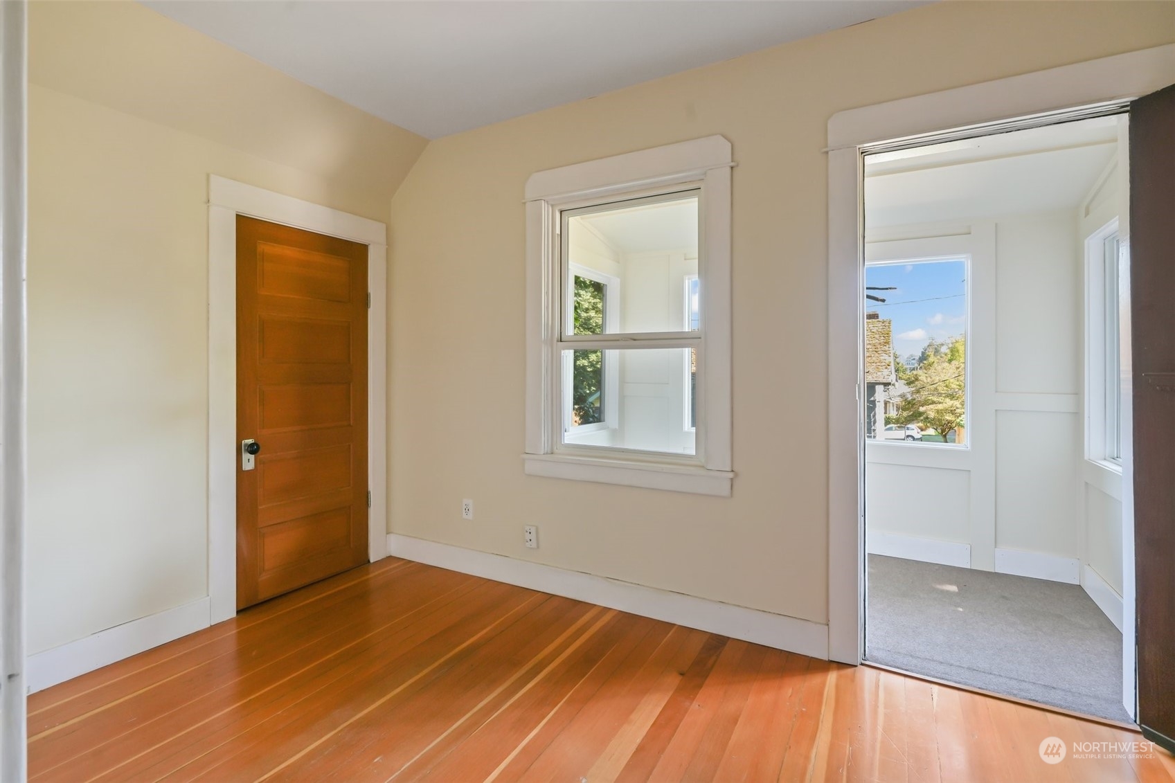 1702 North Pine Street Tacoma, WA 98406 - Photo 24 of 27 an empty room with wooden floor and windows