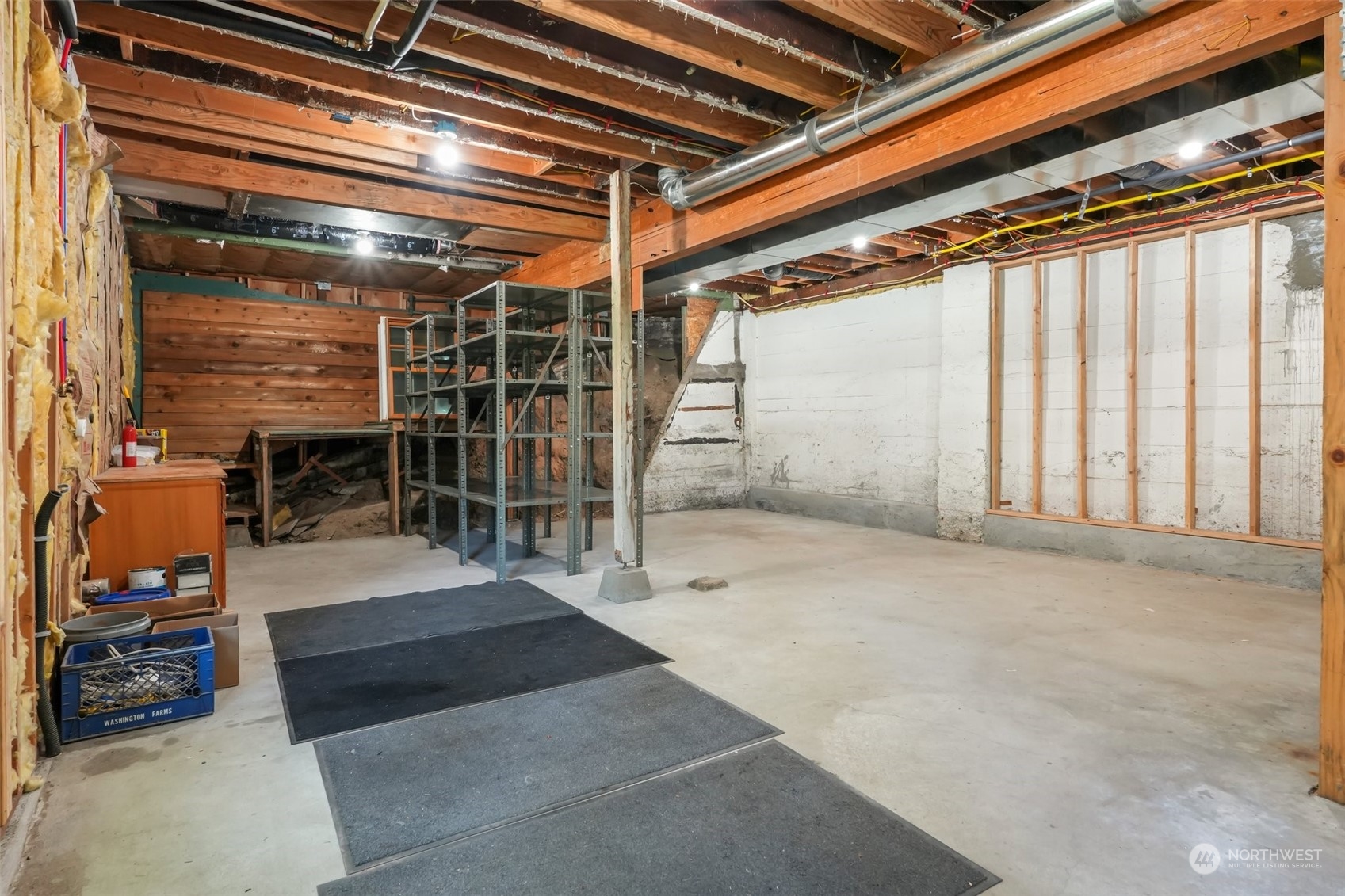 1702 North Pine Street Tacoma, WA 98406 - Photo 25 of 27 a view of an empty room with wooden floor