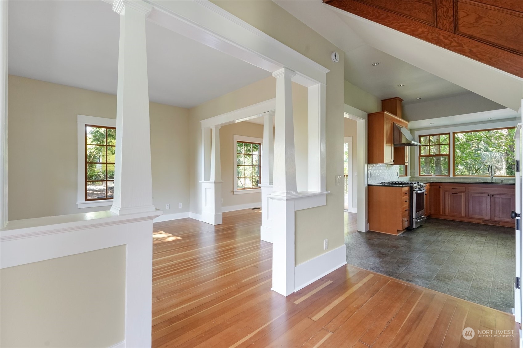1702 North Pine Street Tacoma, WA 98406 - Photo 5 of 27 a view of an entryway with wooden floor and windows