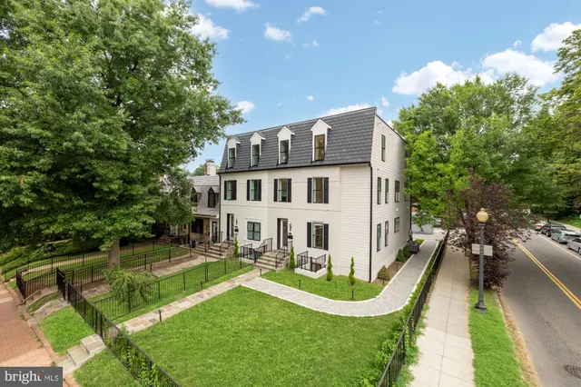 swimming pool view with a garden and plants