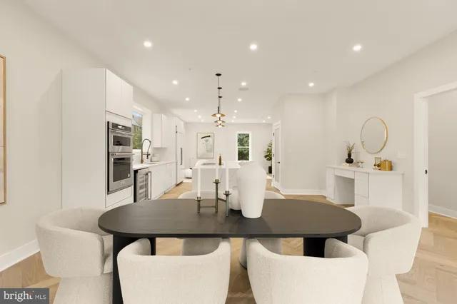 a spacious bedroom with a bed and a walk in closet