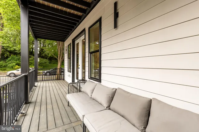 a view of a bedroom with furniture and rug