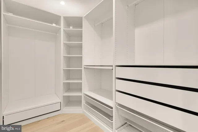 a view of balcony with wooden floor