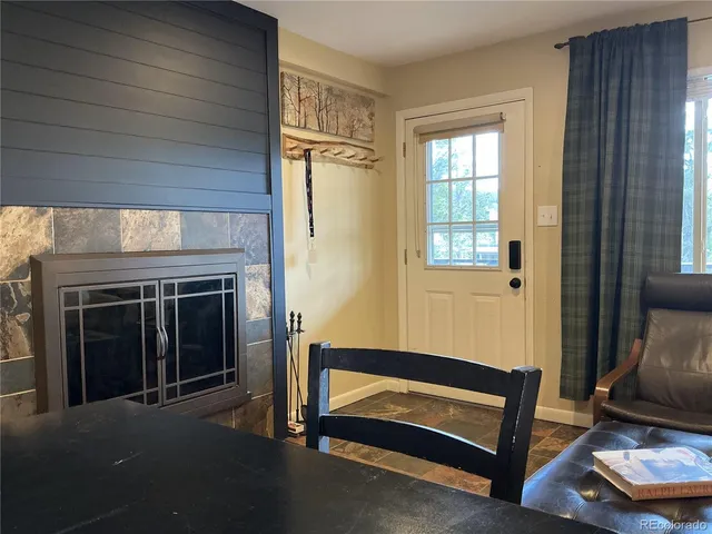 a view of livingroom with furniture and window