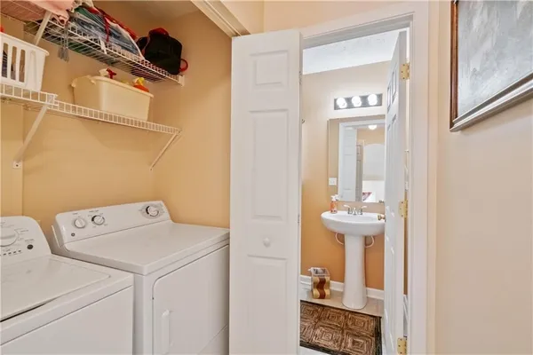 a utility room with dryer and washer