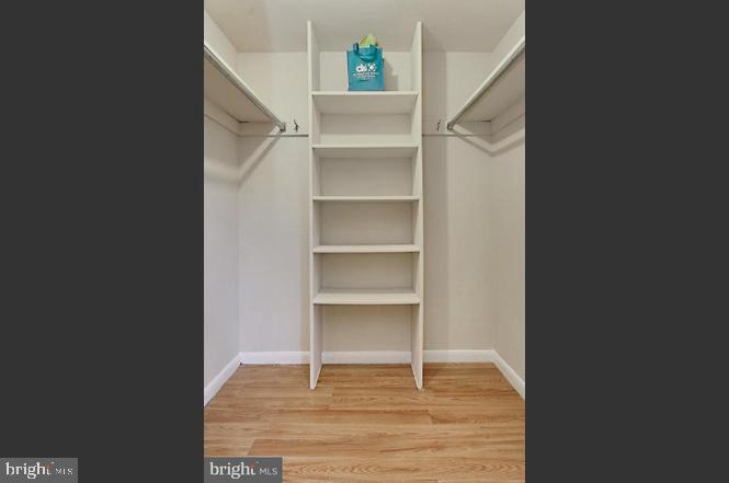 11625 Stoneview Square, Unit 2B Reston, VA 20191 - Photo 16 of 21 a view of an empty room with a window