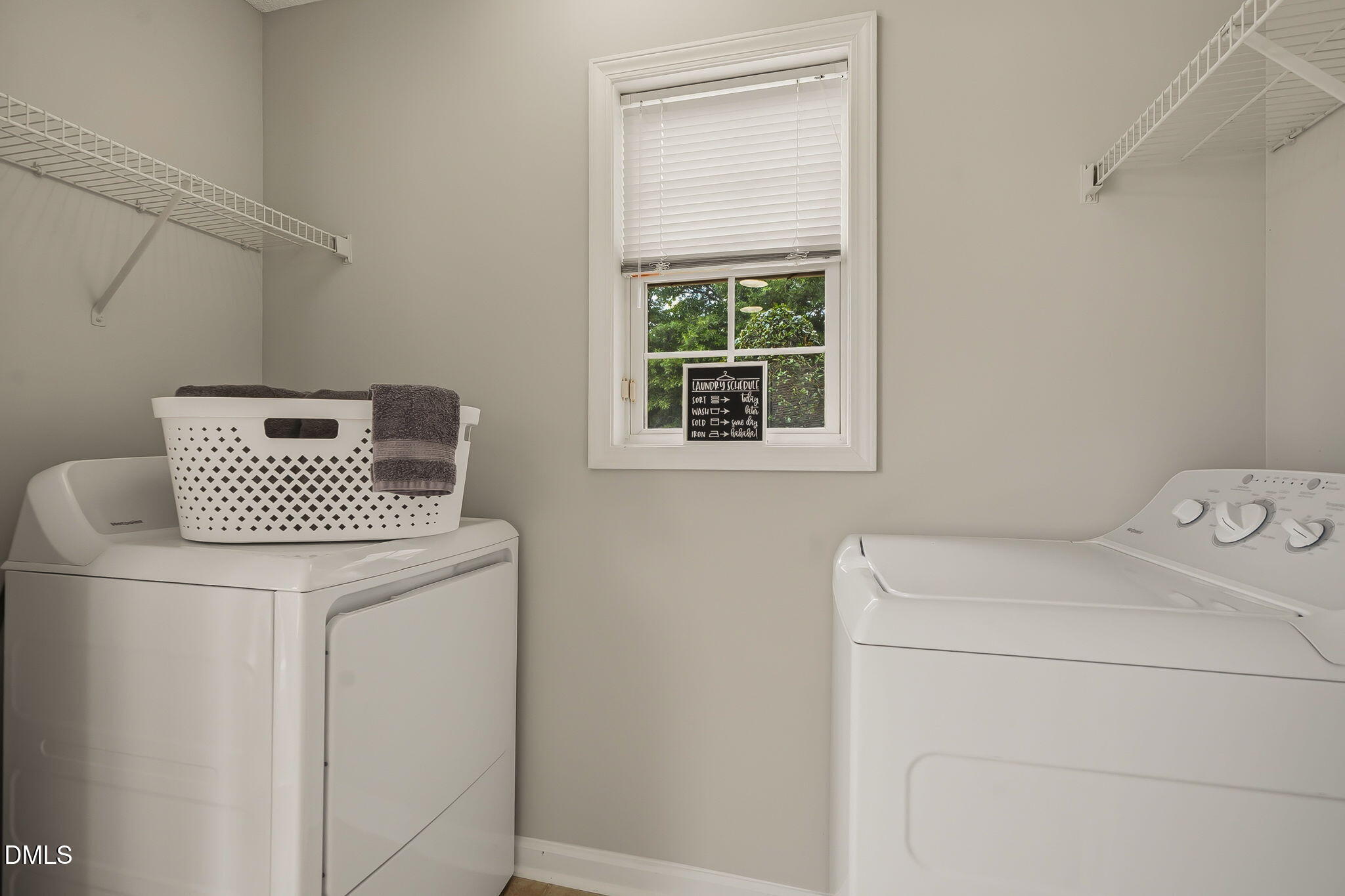 2501 Huntscroft Lane, Unit 100 Raleigh, NC 27617 - Photo 21 of 31 a utility room with dryer and washer