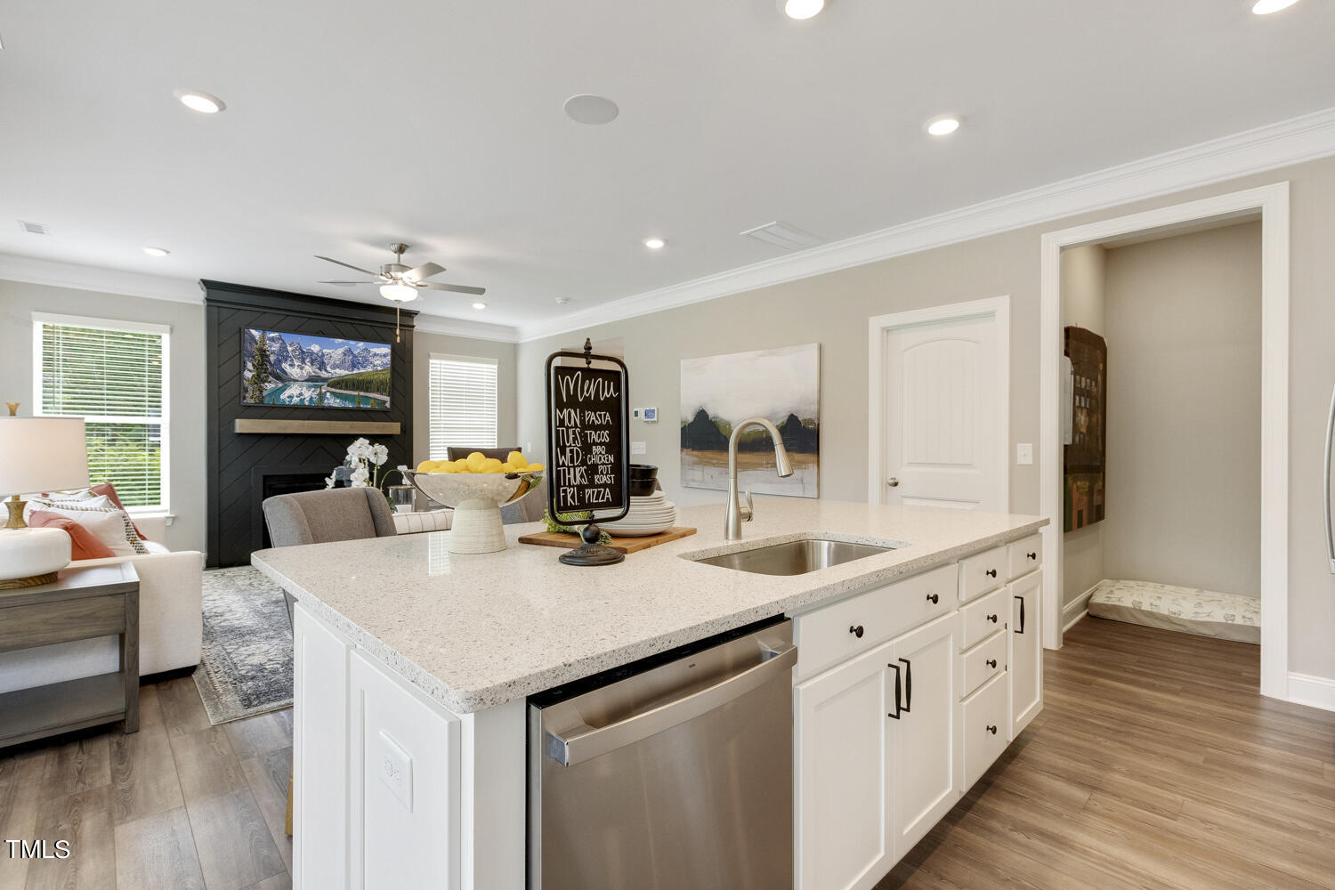 3455 Piedmont Drive Raleigh, NC 27604 - Photo 12 of 47 a large kitchen with sink a counter top space and stainless steel appliances