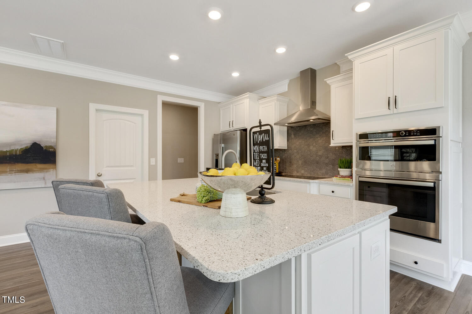 3455 Piedmont Drive Raleigh, NC 27604 - Photo 13 of 47 a kitchen with stainless steel appliances granite countertop a sink a stove and a refrigerator