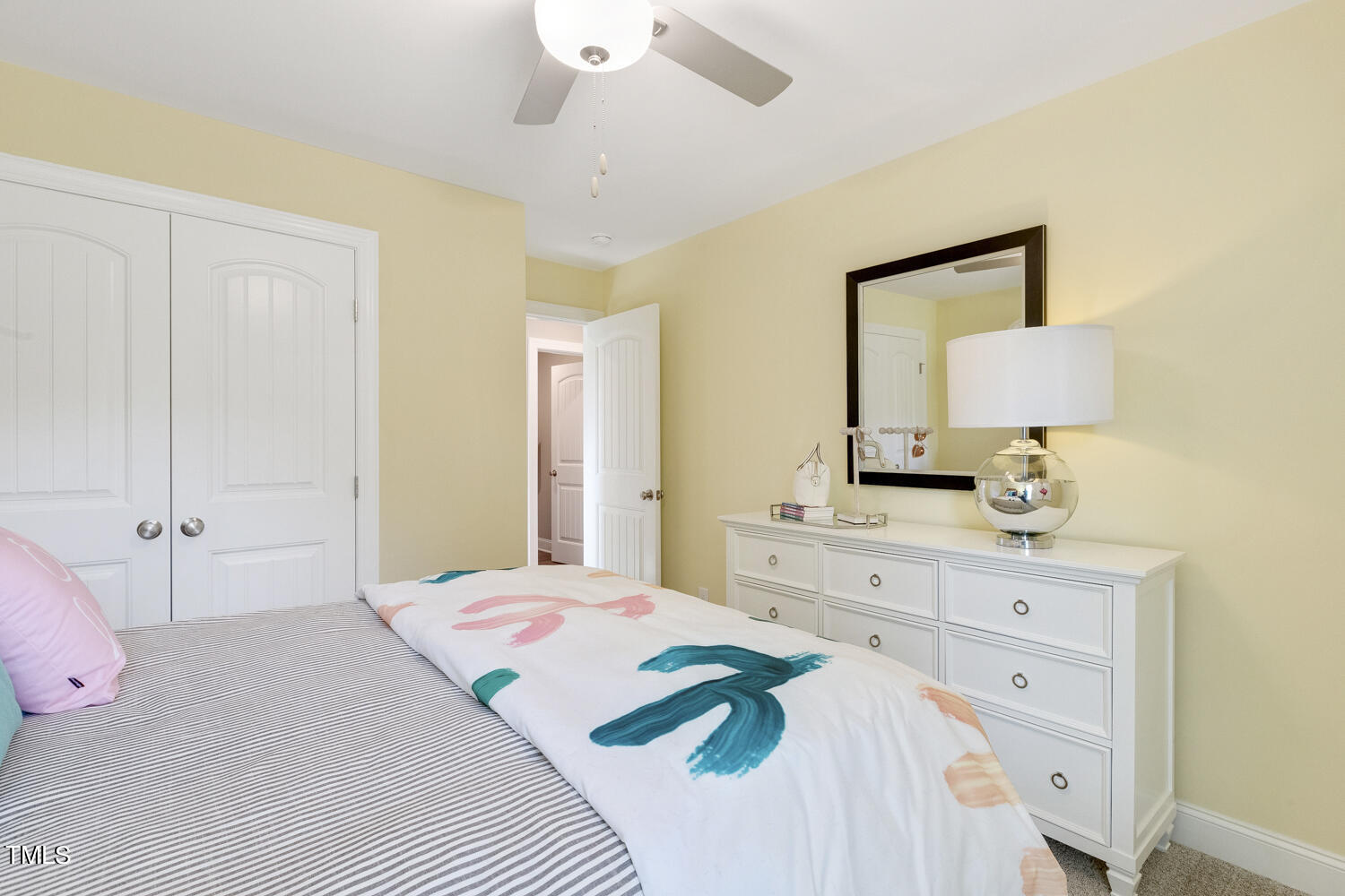 3455 Piedmont Drive Raleigh, NC 27604 - Photo 33 of 47 a bedroom with a bed and a dresser