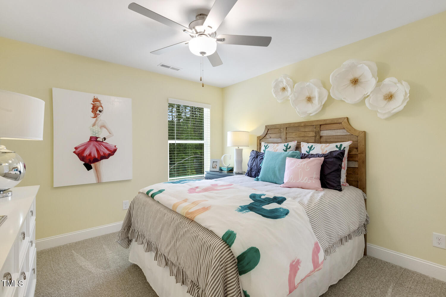 3455 Piedmont Drive Raleigh, NC 27604 - Photo 34 of 47 a bedroom with a bed and a chandelier