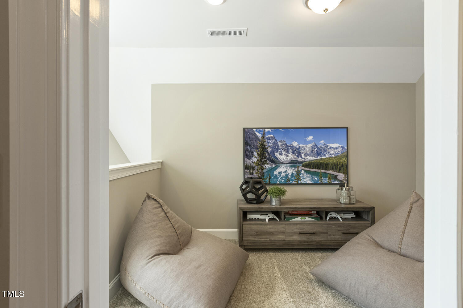 3455 Piedmont Drive Raleigh, NC 27604 - Photo 38 of 47 a living room with furniture and a flat screen tv