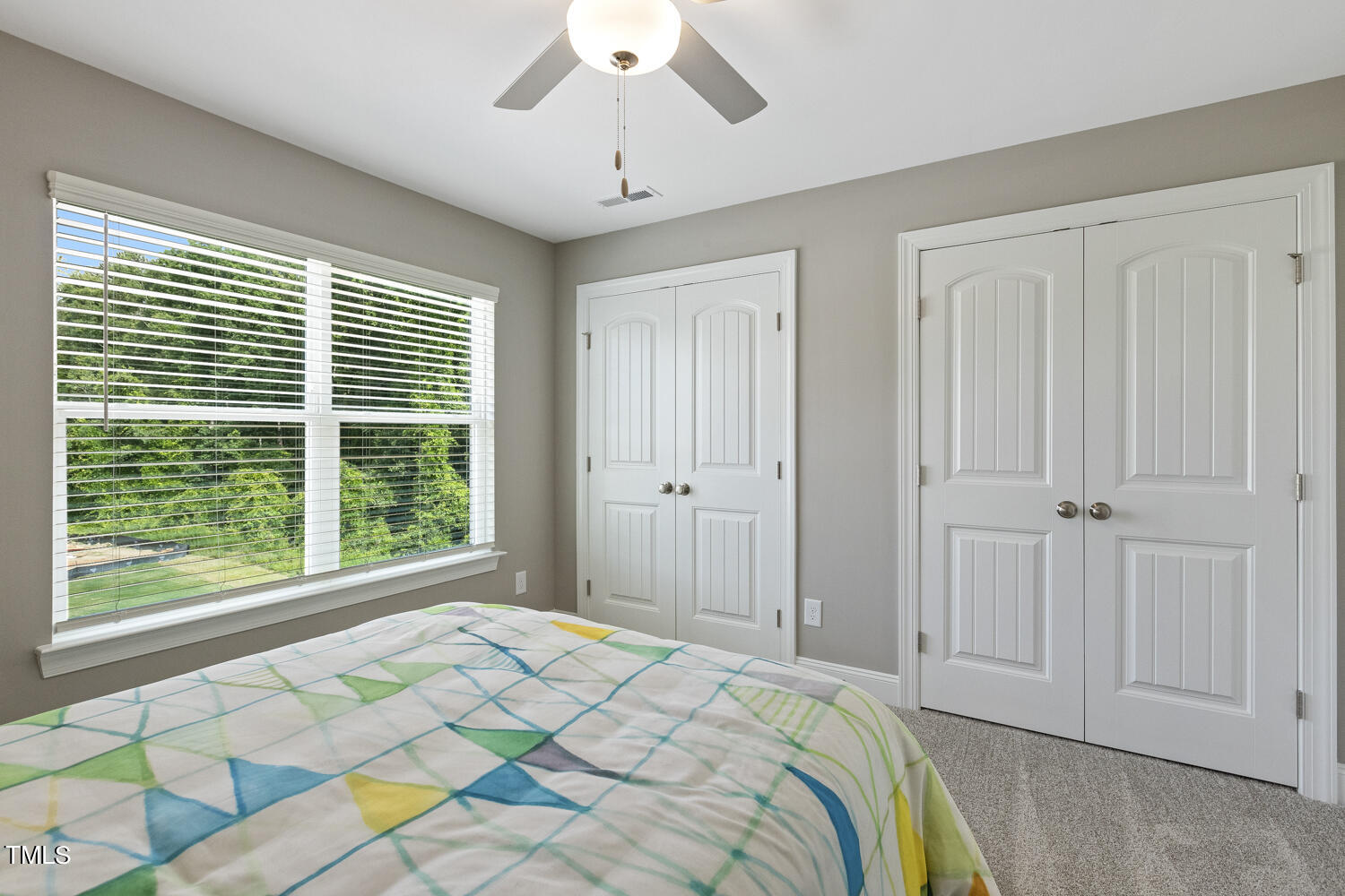 3455 Piedmont Drive Raleigh, NC 27604 - Photo 39 of 47 a bedroom with a bed and a window