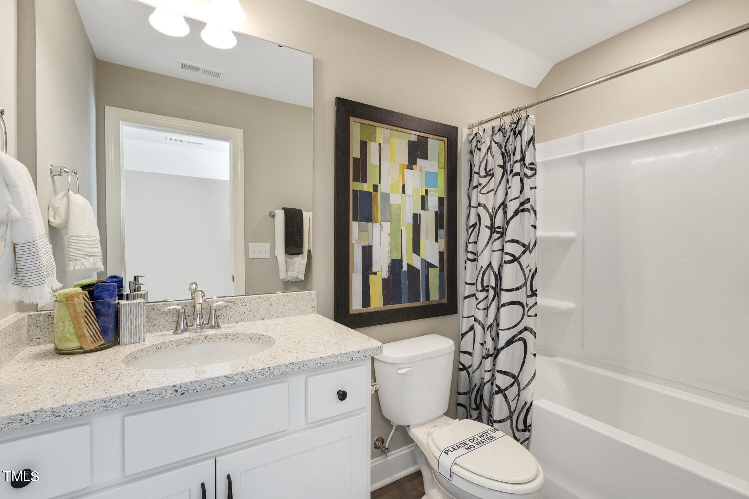 3455 Piedmont Drive Raleigh, NC 27604 - Photo 41 of 47 a bathroom with a granite countertop sink toilet mirror and shower