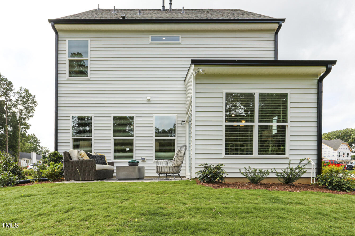 3455 Piedmont Drive Raleigh, NC 27604 - Photo 45 of 47 a view of a house with a yard and sitting area