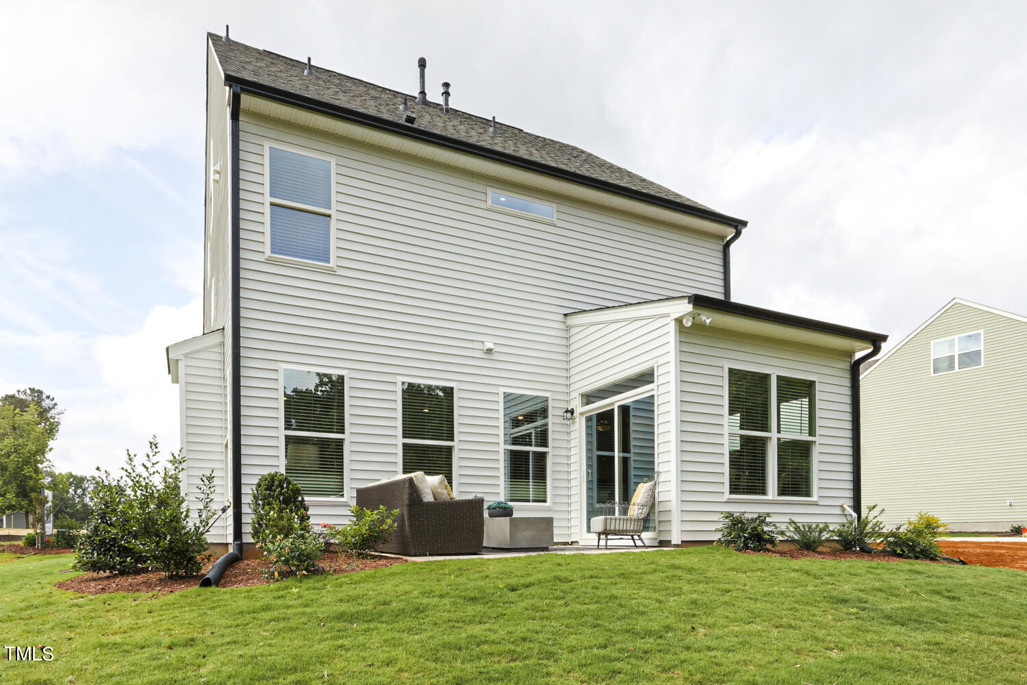 3455 Piedmont Drive Raleigh, NC 27604 - Photo 46 of 47 a front view of house with yard and outdoor seating