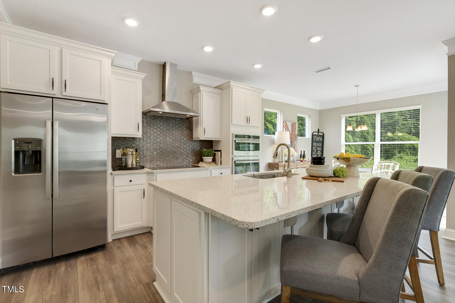 3455 Piedmont Drive Raleigh, NC 27604 - Photo 10 of 47 a kitchen with counter top space cabinets and stainless steel appliances