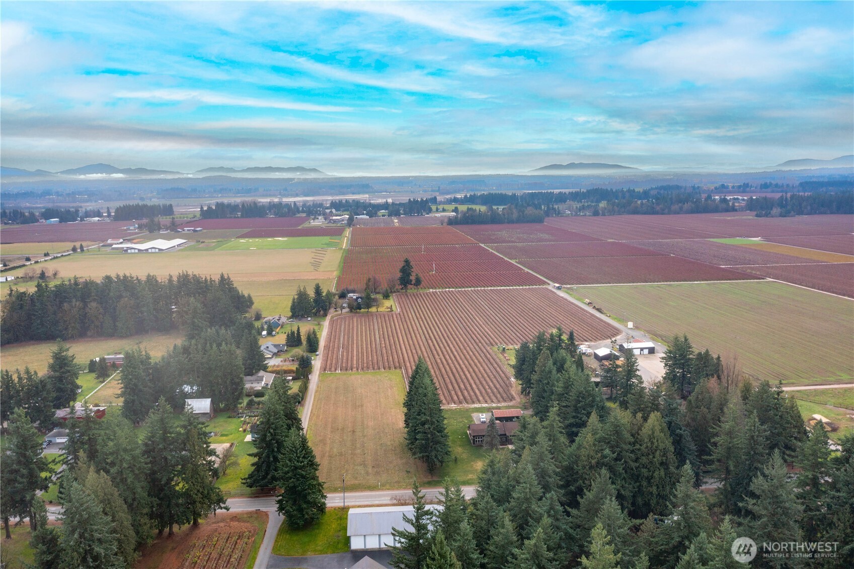 0 Loomis Trail Road Lynden, WA 98264 - Photo 16 of 18 an aerial view of a house with a lake view