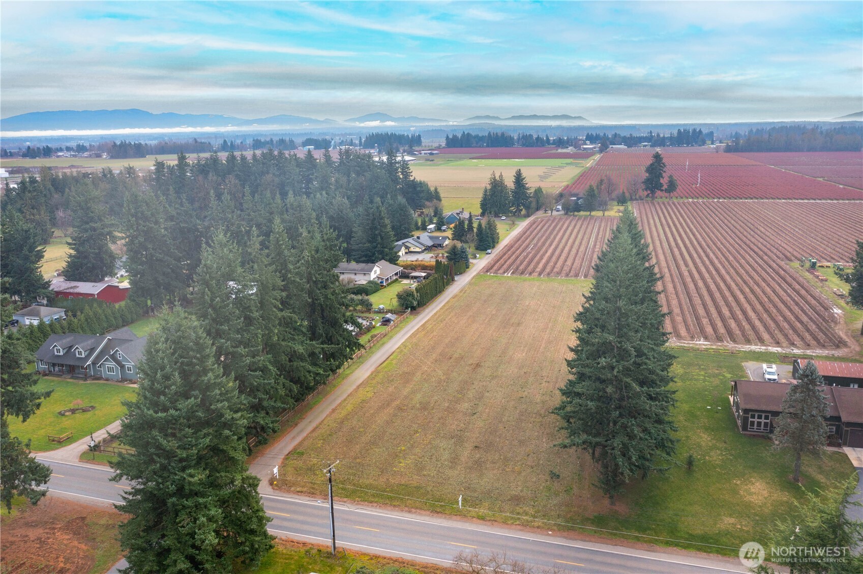 0 Loomis Trail Road Lynden, WA 98264 - Photo 10 of 18 a view of a lake from a balcony