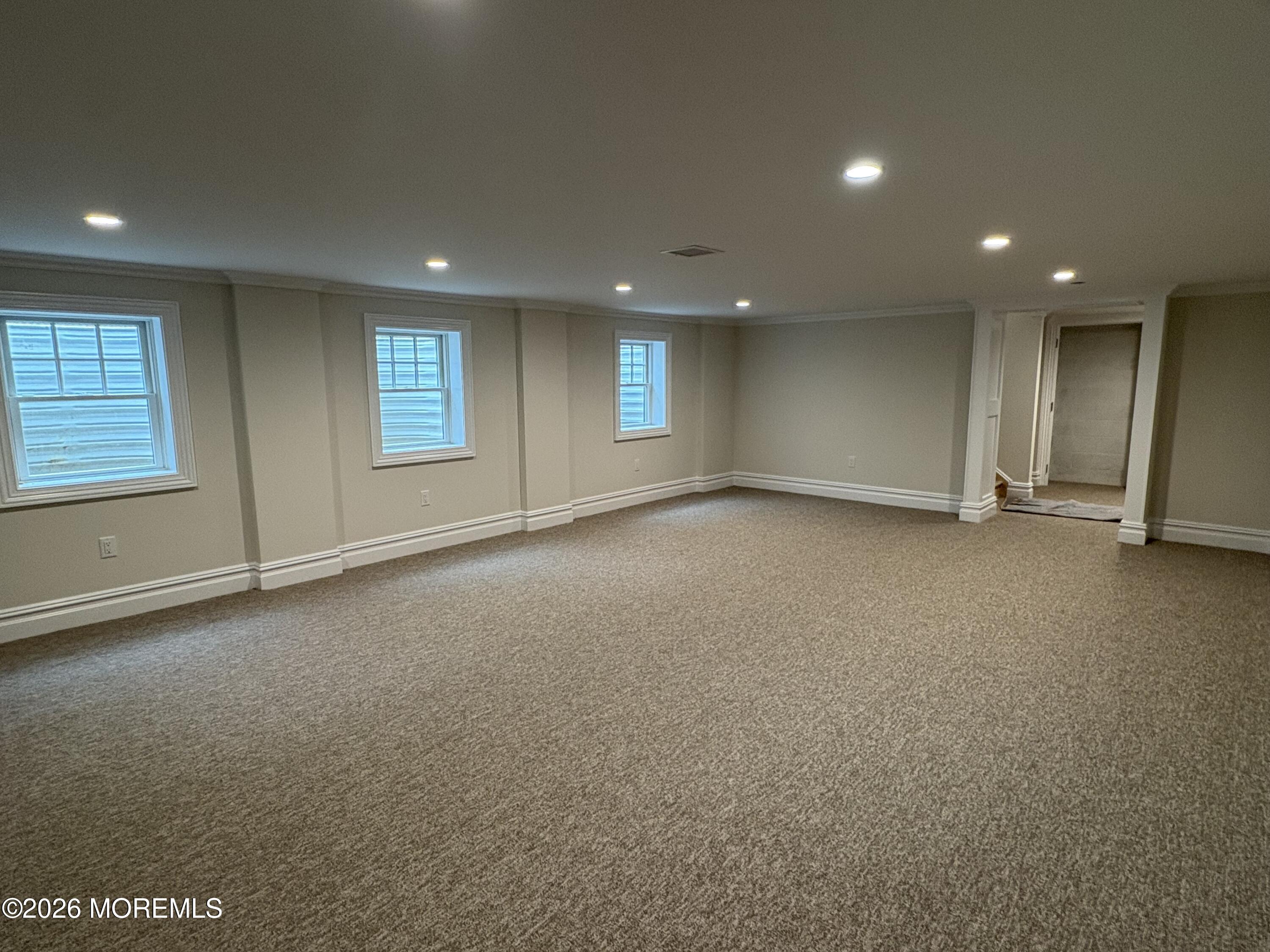 179 Rumson Road Little Silver, NJ 07739 - Photo 20 of 25 an empty room with a empty space and windows