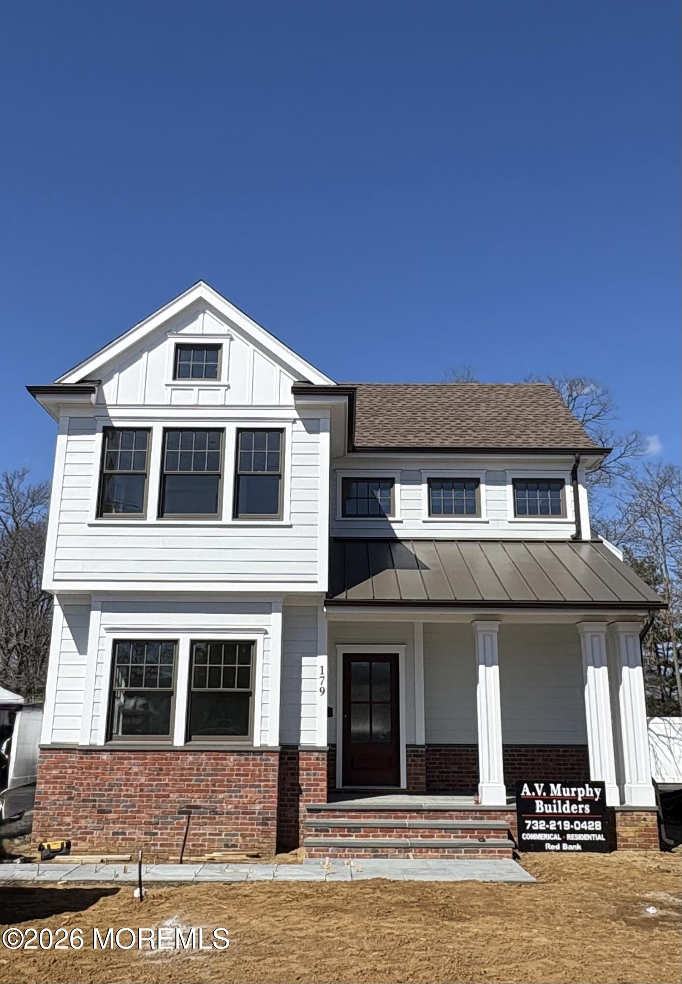 179 Rumson Road Little Silver, NJ 07739 - Photo 3 of 25 a front view of a house with garage