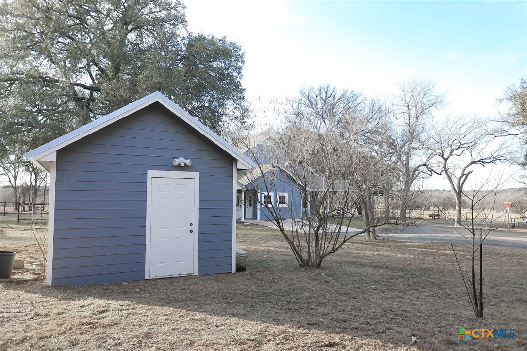1701 Sulpher Wells Road Salado, TX 76571 - Photo 28 of 34 a view of a house with a yard