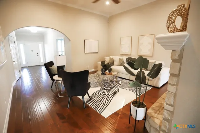 a spacious bedroom with a bed and a couch